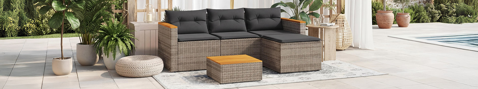 Set da salotto in rattan a 3 pezzi con cuscini e coperta grigia. Clicca per acquistare la collezione.
